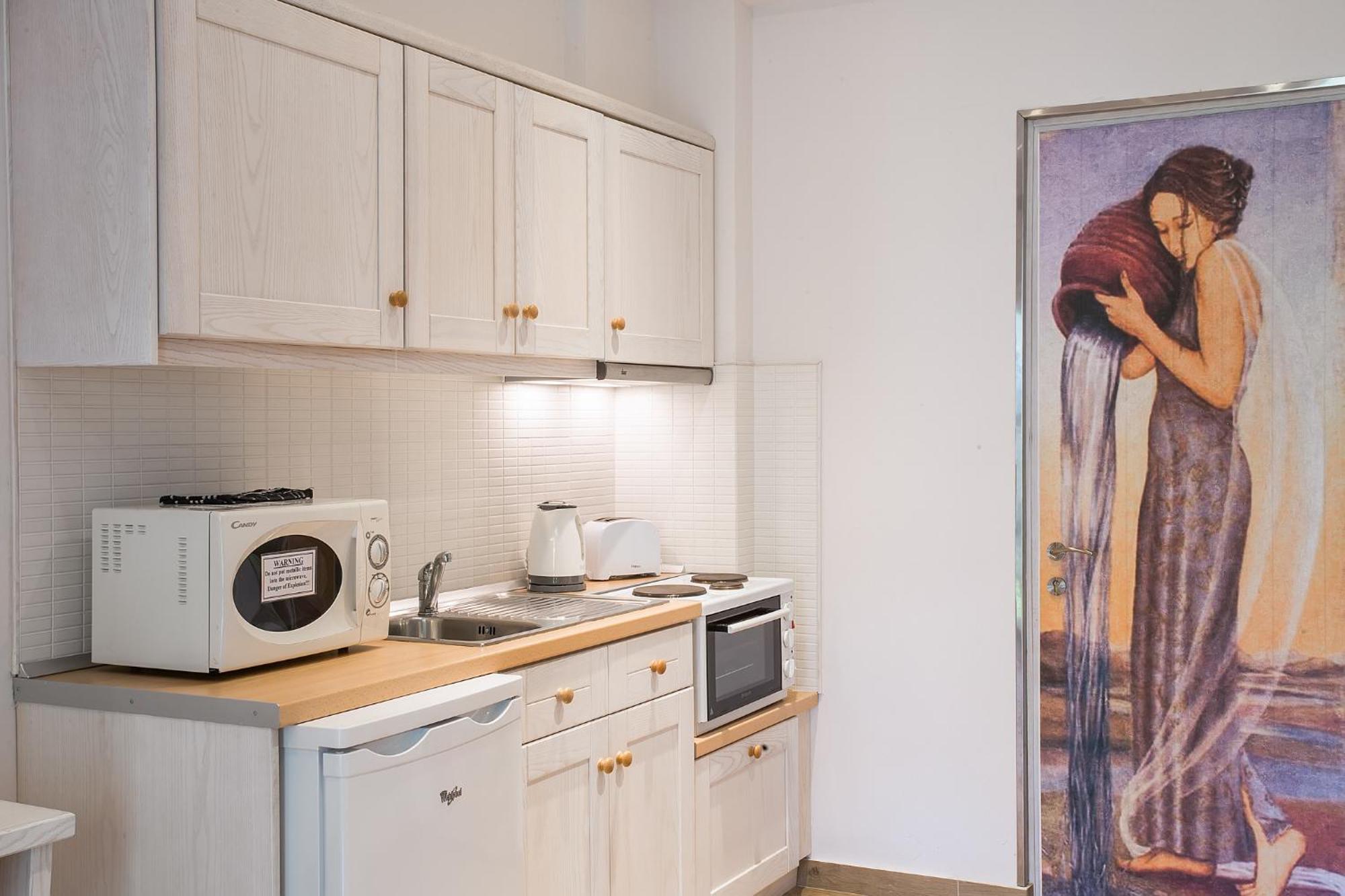 Spiti Prifti Apartments Gouvia Bagian luar foto